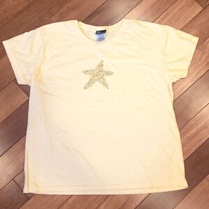 Women's size XL Tshirt light yellow with rhinestone starfish.